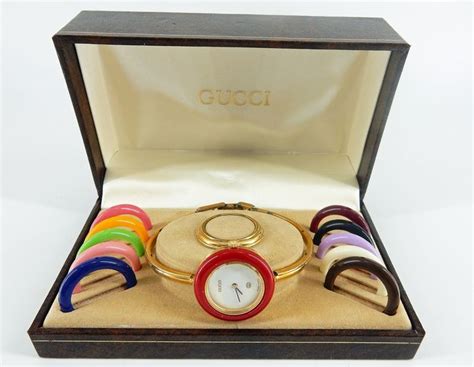 GUCCI Montre bracelet iconique 11.12 à anneaux .